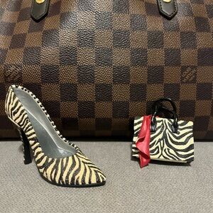 Zebra print purse and heel shoe figurine
